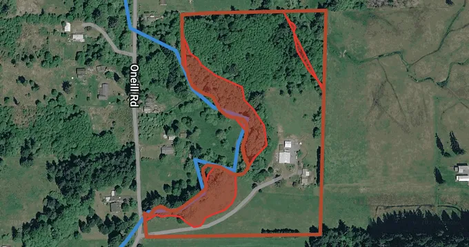 Aerial of 82 Oneill Rd with the parcel boundary, flood and wetland overlays